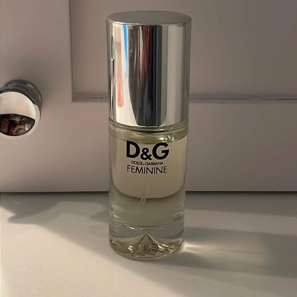 Full bottle of D & G perfume.